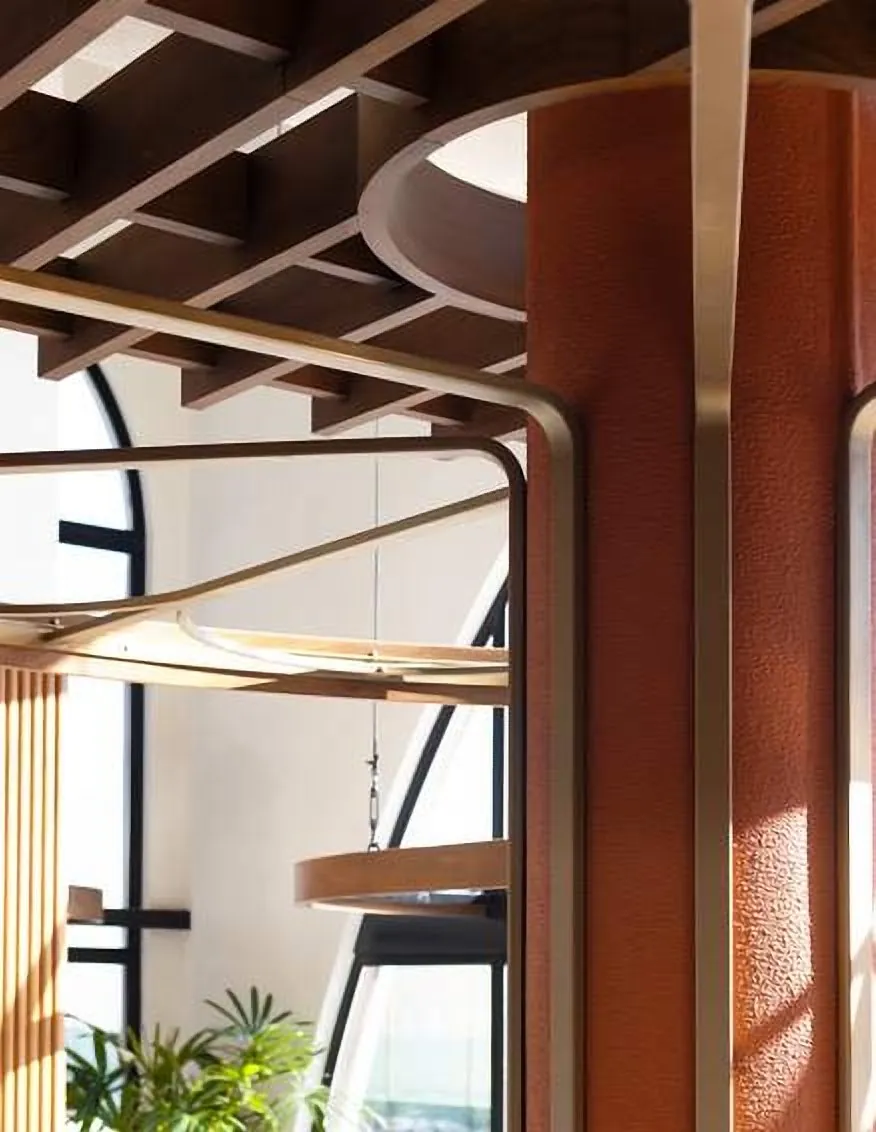 Brass-framed screen and timber detail