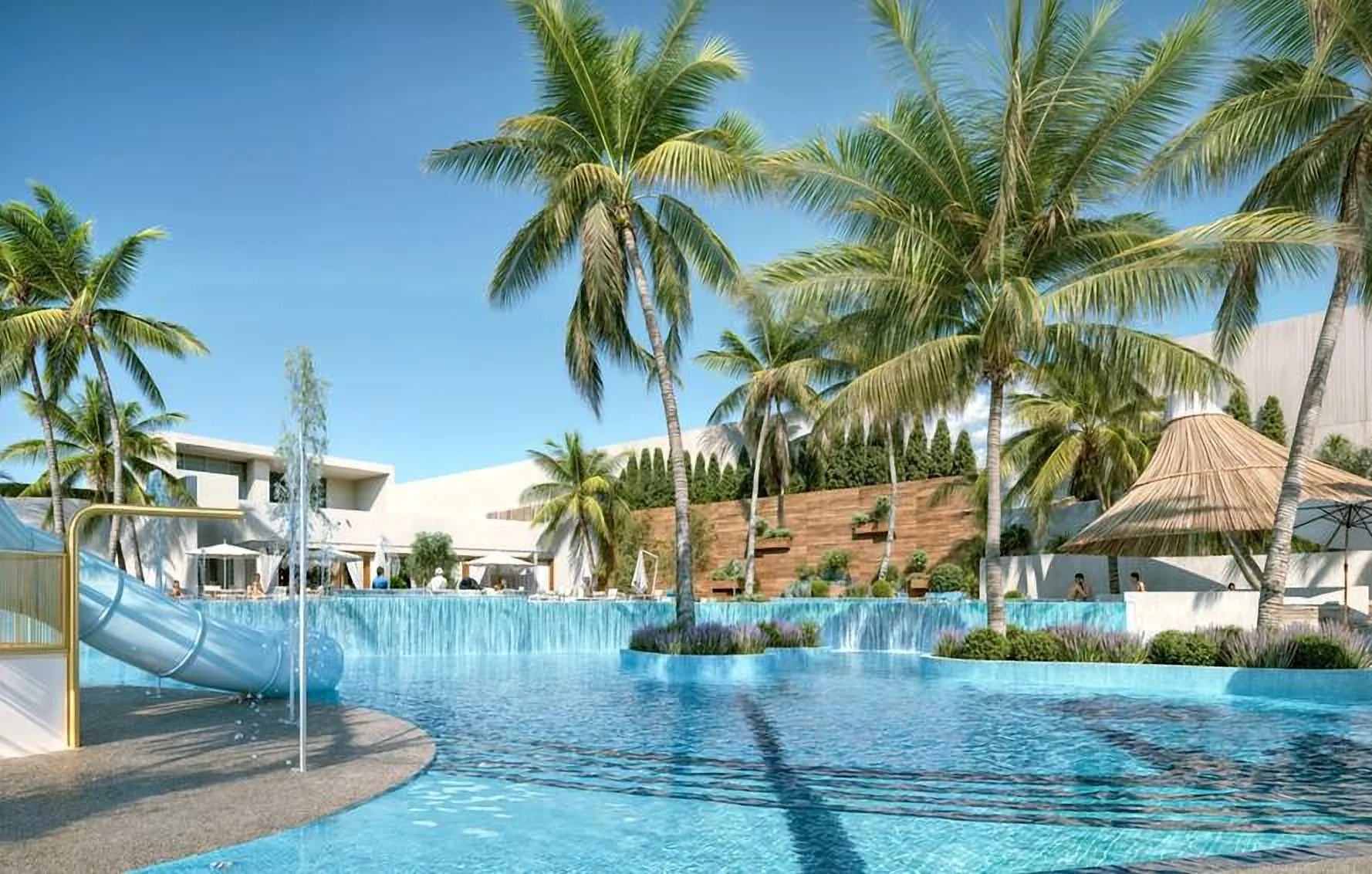 Lagoon pool edged by palms and cabanas