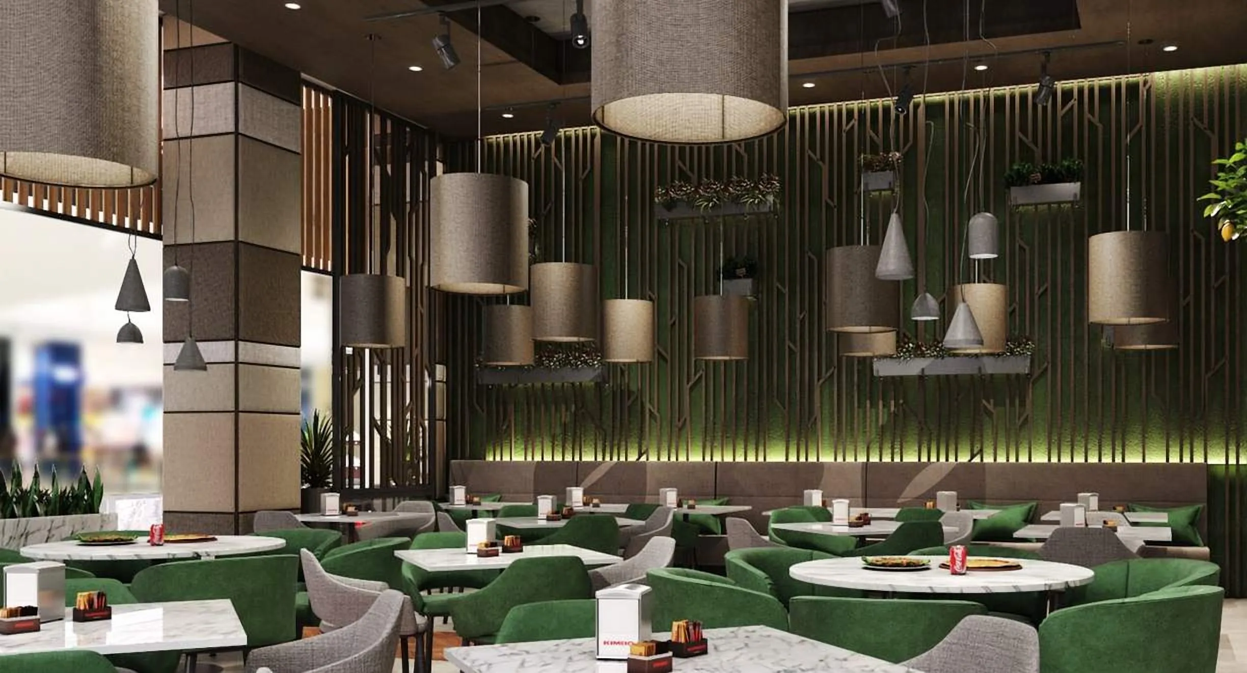 Café lounge with green seating and pendant lights